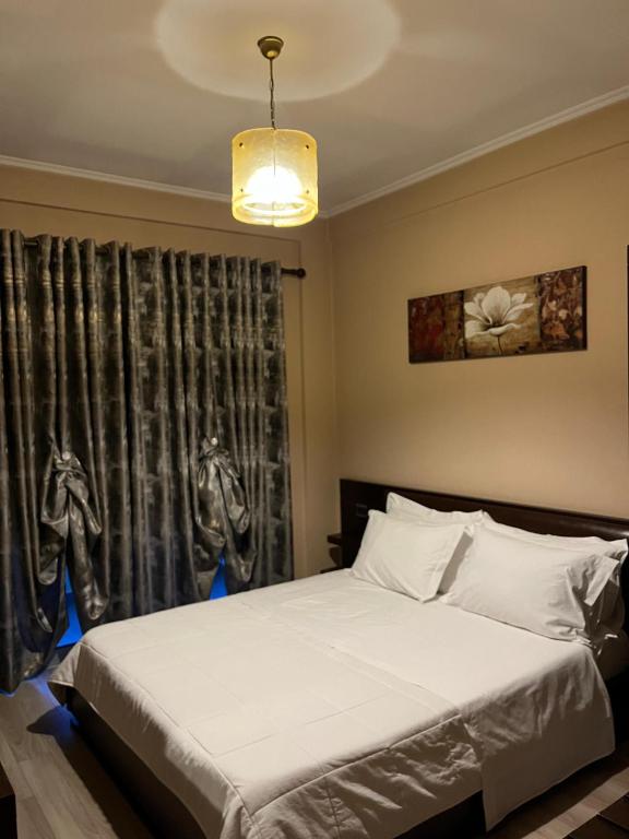 Postel nebo postele na pokoji v ubytování Dream's Hotel