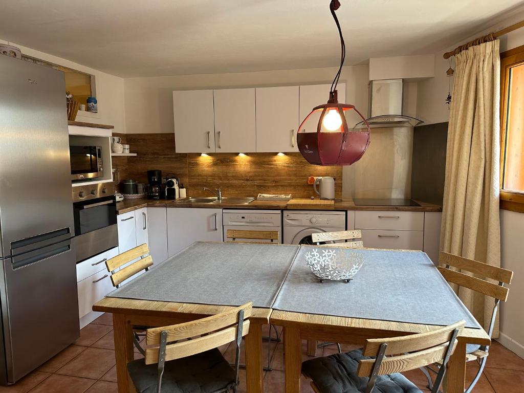 Kuchyň nebo kuchyňský kout v ubytování Chalet Barmaz