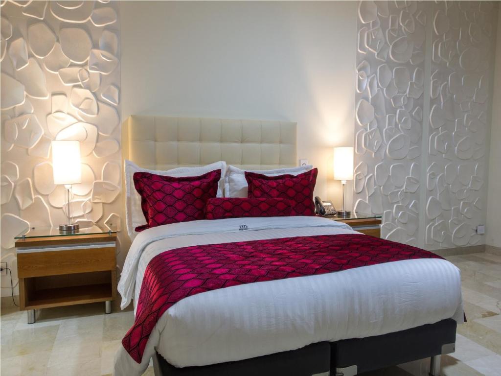 Postel nebo postele na pokoji v ubytování Hotel Dorado La 70