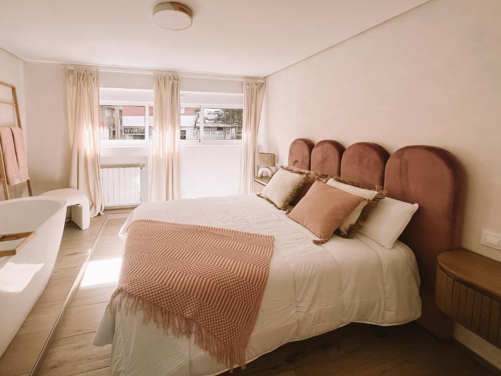 Postel nebo postele na pokoji v ubytování Villa Rosada • Pontevedra