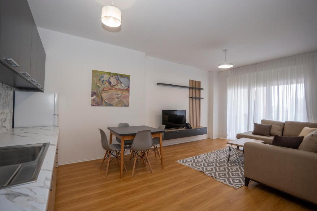 TV a/nebo společenská místnost v ubytování Shkodra Harmony Residences
