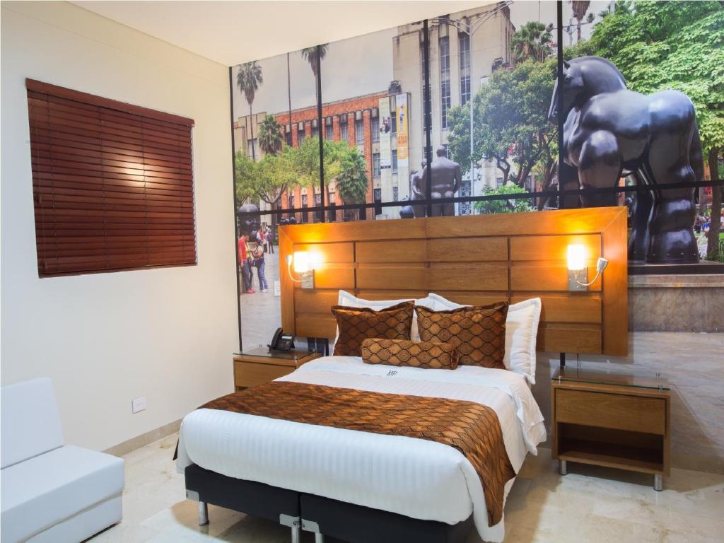 Postel nebo postele na pokoji v ubytování Hotel Dorado La 70