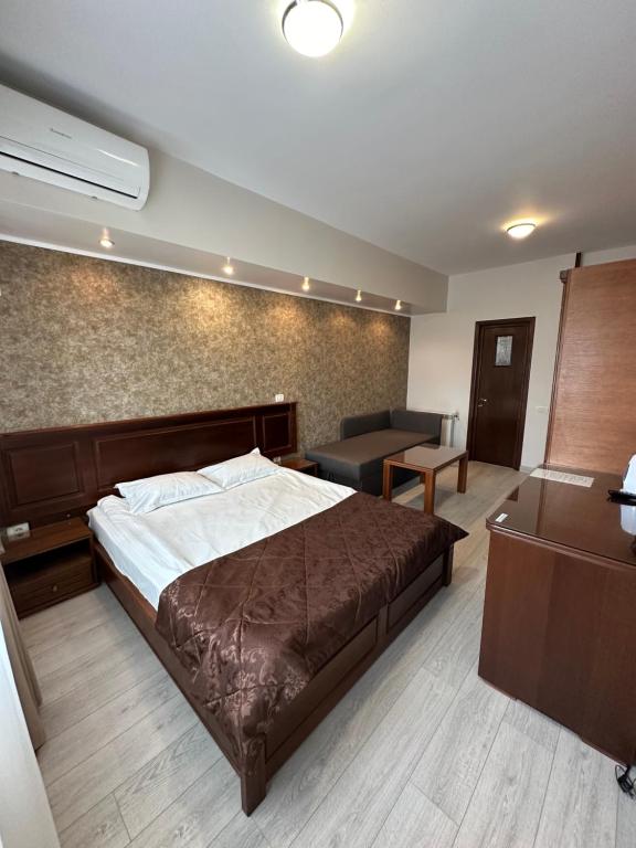 Postel nebo postele na pokoji v ubytování Hotel Ana