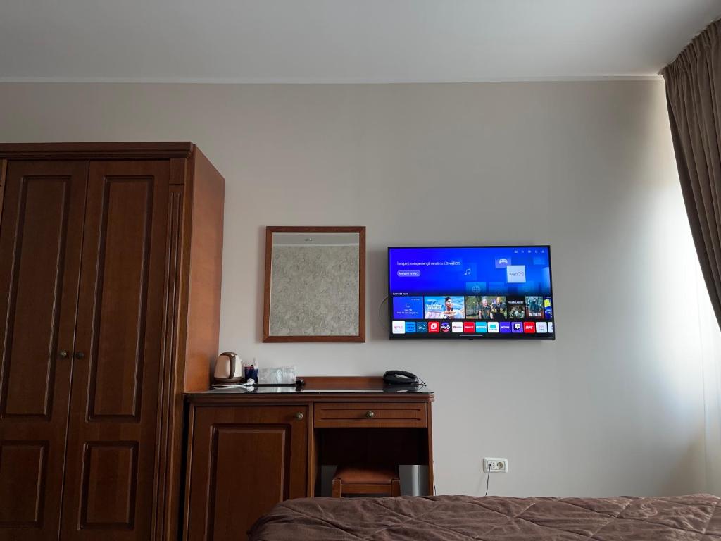 TV a/nebo společenská místnost v ubytování Hotel Ana
