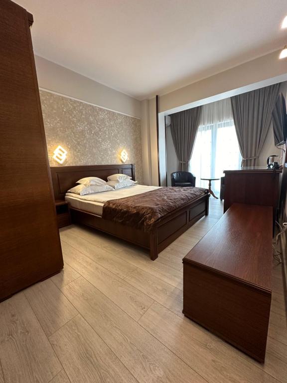 Postel nebo postele na pokoji v ubytování Hotel Ana