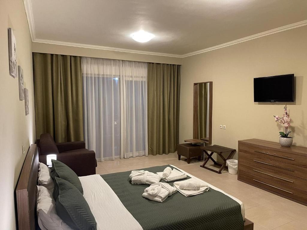 Voodi või voodid majutusasutuse Orchidea Hotel toas