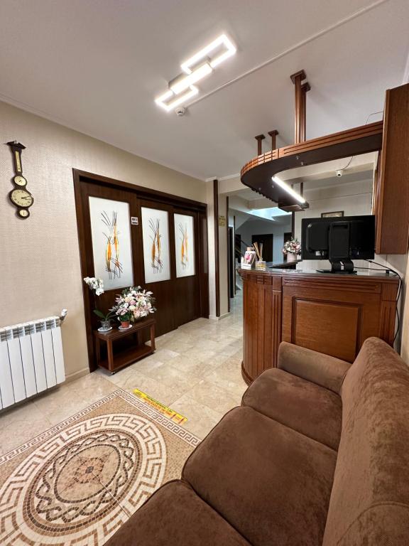 Kuchyň nebo kuchyňský kout v ubytování Hotel Ana