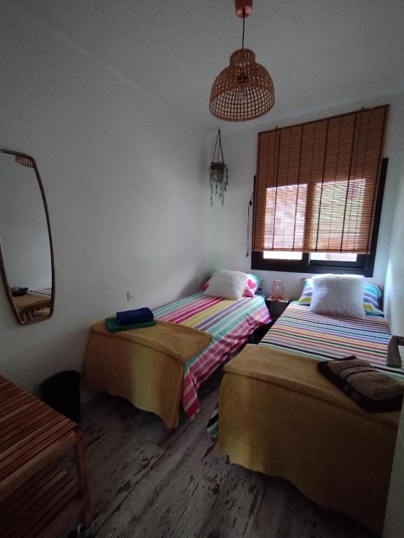 Postel nebo postele na pokoji v ubytování Apartment Barca 1 Camp Nou