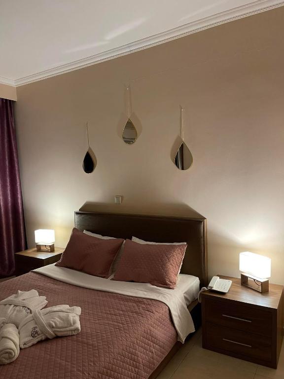 Voodi või voodid majutusasutuse Orchidea Hotel toas