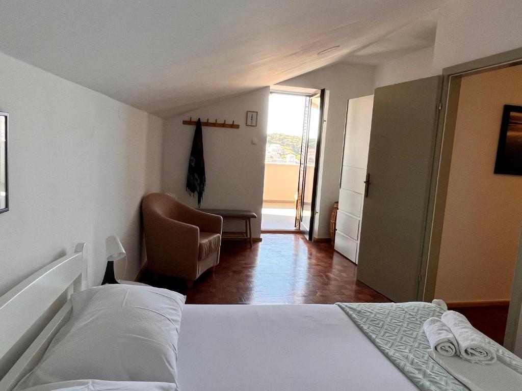 Posteľ alebo postele v izbe v ubytovaní Apartment Oscar