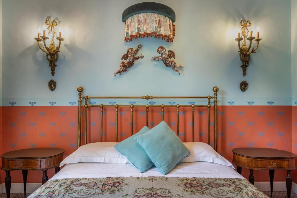 Postel nebo postele na pokoji v ubytování Villa Nicolaci - Liberty Suites
