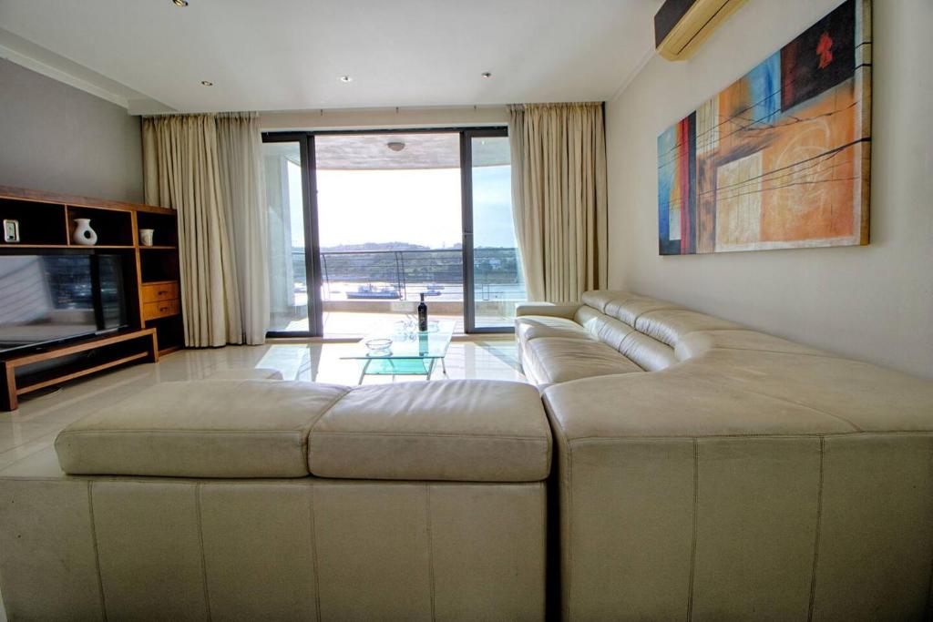 TV o dispositivi per l'intrattenimento presso The Strand Apartments By Homely