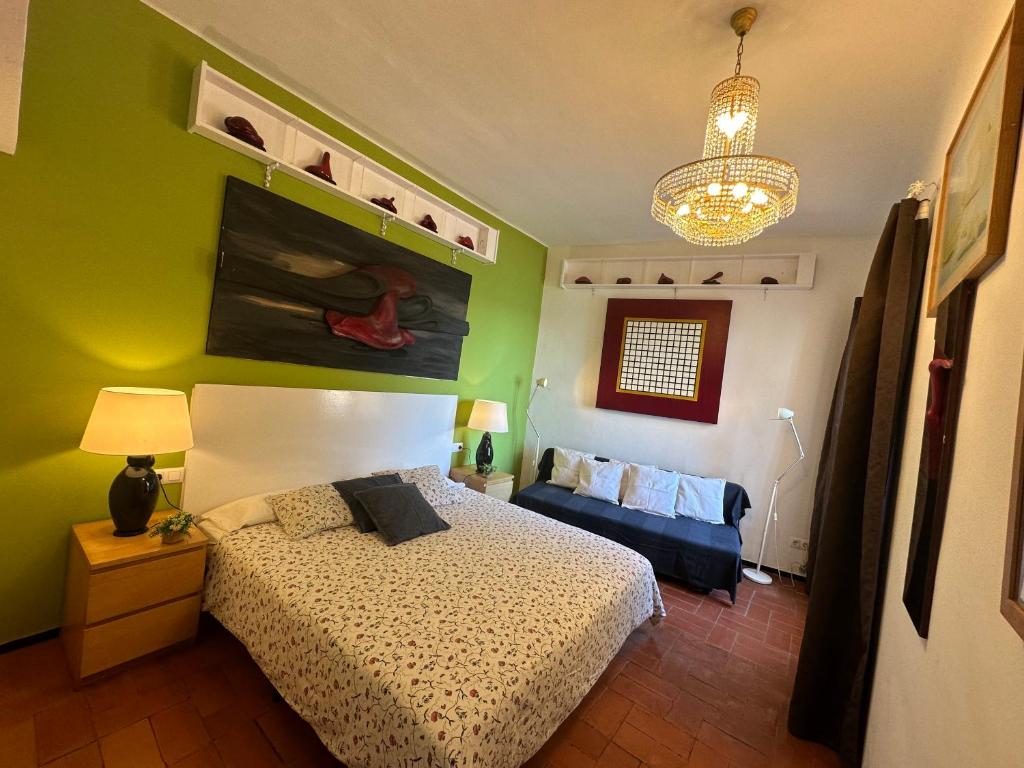 Postel nebo postele na pokoji v ubytování Apartamento con jardín a 11 metros de la playa. SE.