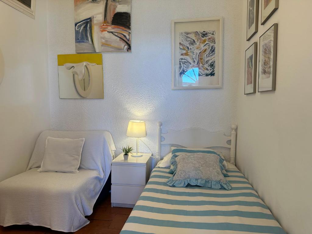 Postel nebo postele na pokoji v ubytování Apartamento con jardín a 11 metros de la playa. SE.