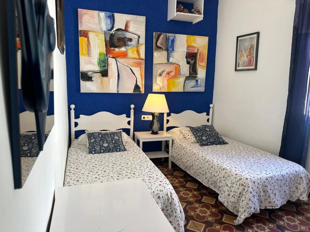 Postel nebo postele na pokoji v ubytování Apartamento con jardín a 11 metros de la playa. SE.