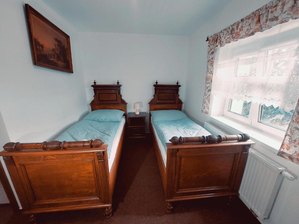 Postel nebo postele na pokoji v ubytování Hotel u Jindry