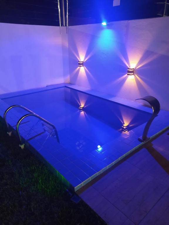 Πισίνα στο ή κοντά στο Beach House Praia de Carapibus