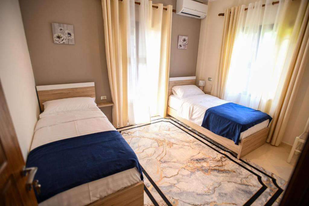Postel nebo postele na pokoji v ubytování Villa Solitude