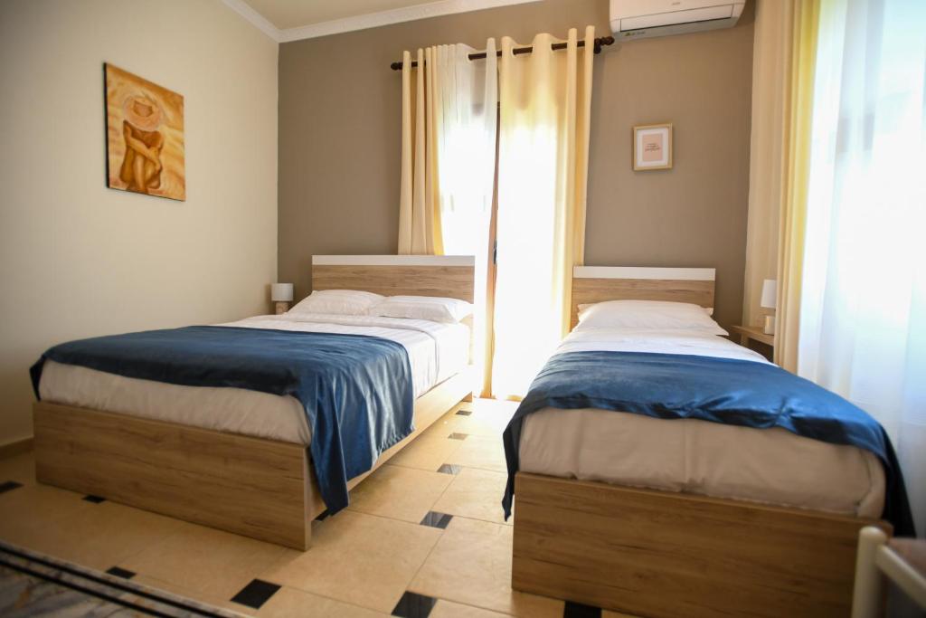 Postel nebo postele na pokoji v ubytování Villa Solitude