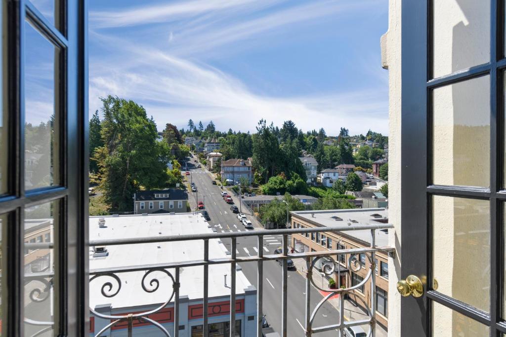 a view from a window of a city at Norblad Hotel in Astoria, Oregon