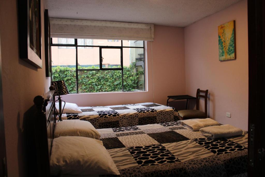 Postel nebo postele na pokoji v ubytování Casa de Tulia