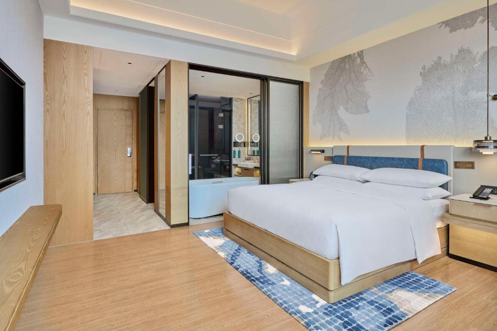 Postel nebo postele na pokoji v ubytování DoubleTree by Hilton Guangzhou Zengcheng