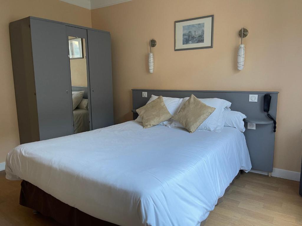 Postel nebo postele na pokoji v ubytování Auberge Champenoise