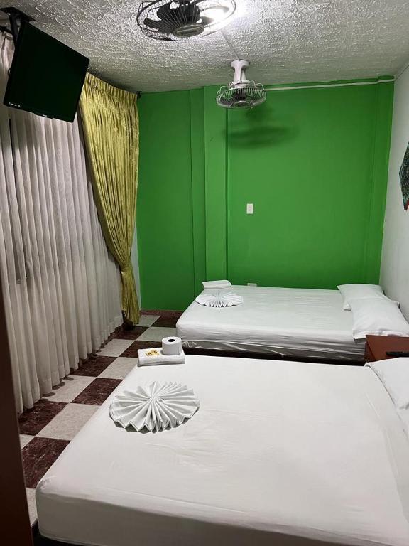 Postel nebo postele na pokoji v ubytování Hotel damayu