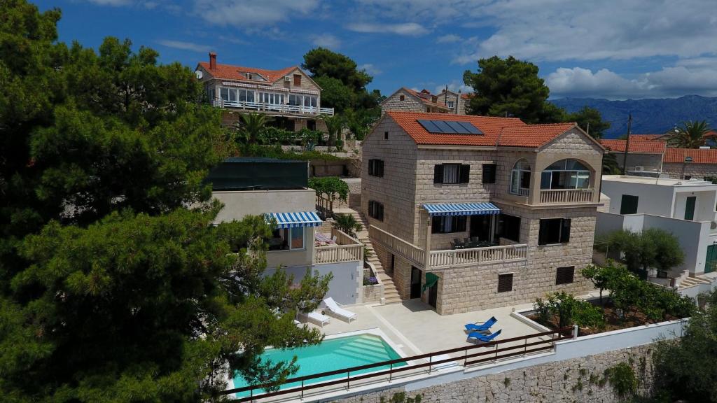 Πισίνα στο ή κοντά στο Seaside apartments with a swimming pool Selca, Brac - 22810