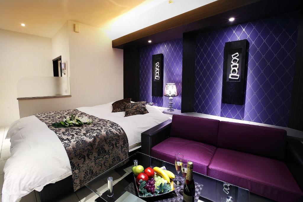 Postel nebo postele na pokoji v ubytování Hotel L'eclair (Adult Only)