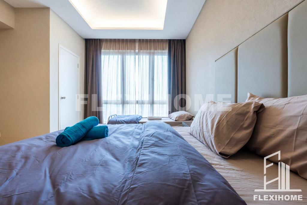 Säng eller sängar i ett rum på Dorsett Residences, Sri Hartamas-KL, Hotel Theme Studio Homes by Flexihome-MY