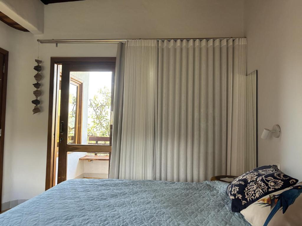 Postel nebo postele na pokoji v ubytování Casa Prosperidade