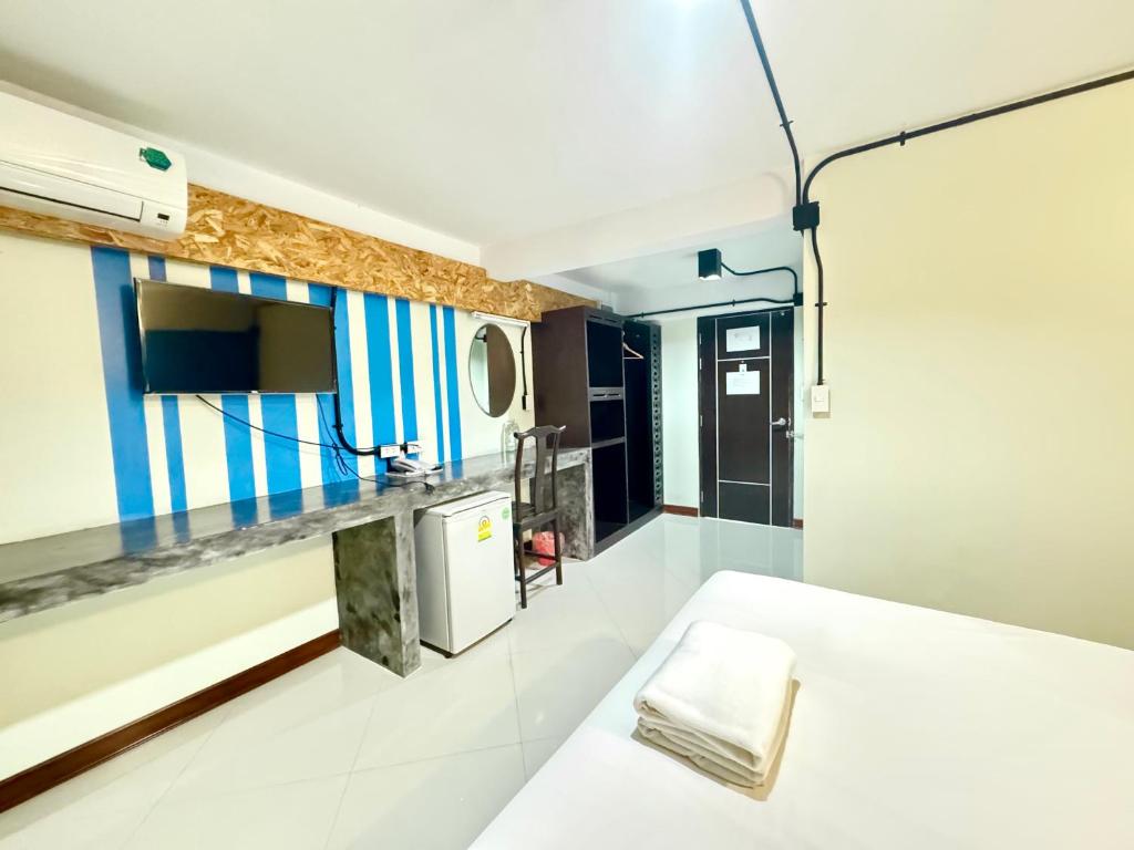 Kuchyň nebo kuchyňský kout v ubytování บ้านสวนรีสอร์ท นครสวรรค์