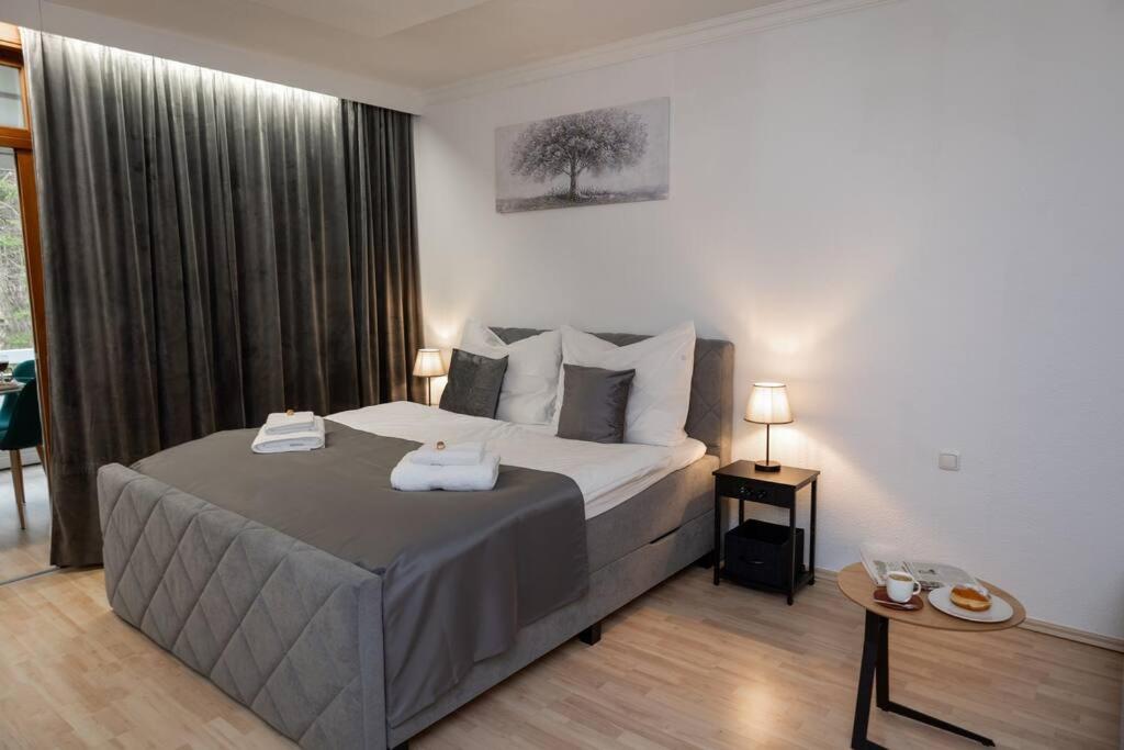 Postel nebo postele na pokoji v ubytování Apartment am Ossiachersee mit eigenem Seezugang