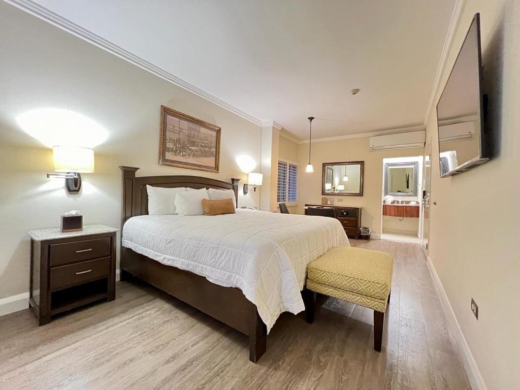 Postel nebo postele na pokoji v ubytování Hotel Caesars
