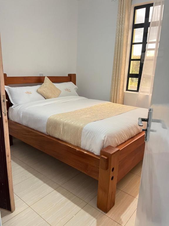 Llit o llits en una habitació de The comfortplace 1 bedroom