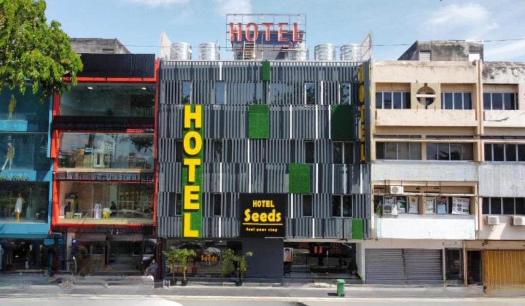 a building with the word hotel on the side of it at Seeds Hotel Cheras Maluri in Kuala Lumpur