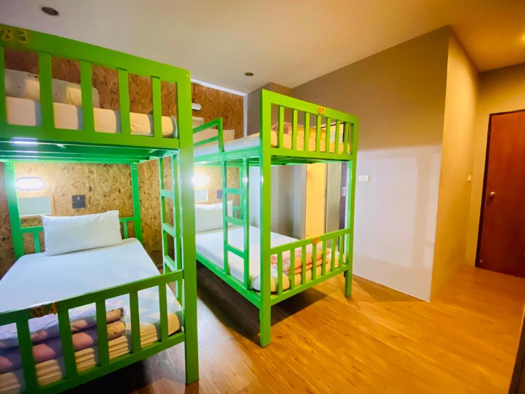 Postel nebo postele na pokoji v ubytování Frutta Hostel