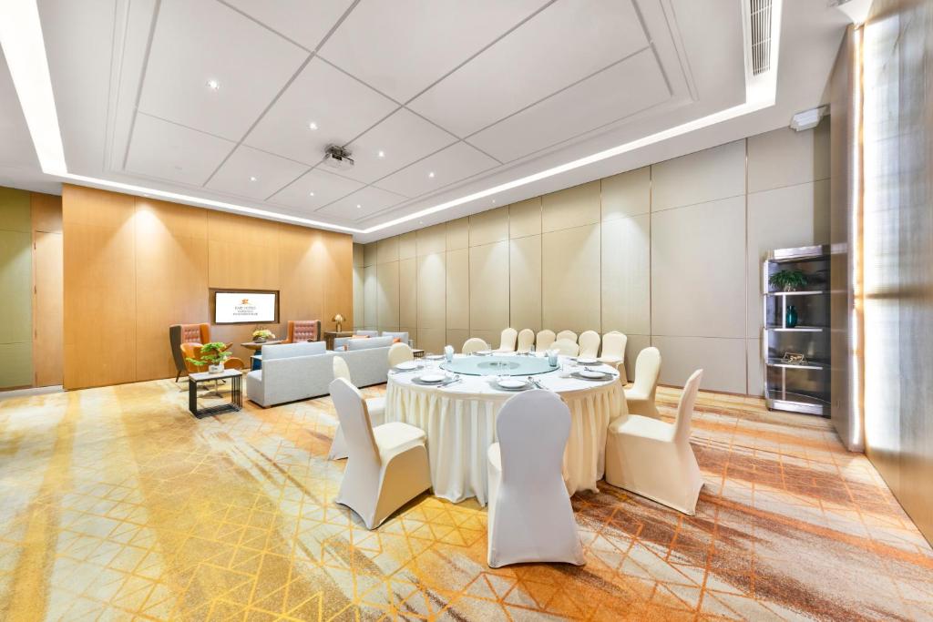 TV a/nebo společenská místnost v ubytování KARE HOTELS RESIDENCES Qianhai Shenzhen