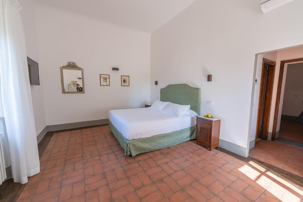 Postel nebo postele na pokoji v ubytování Corte Di Valle