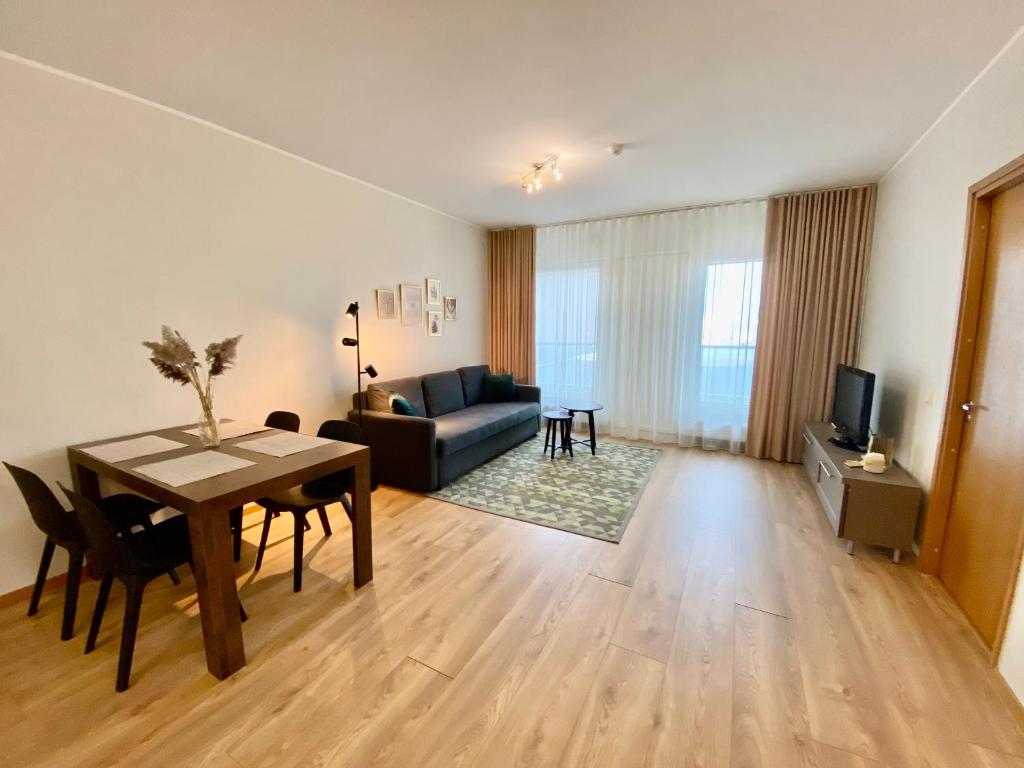 TV a/nebo společenská místnost v ubytování Cozy Foorum Apartment - Tallinn City Centre