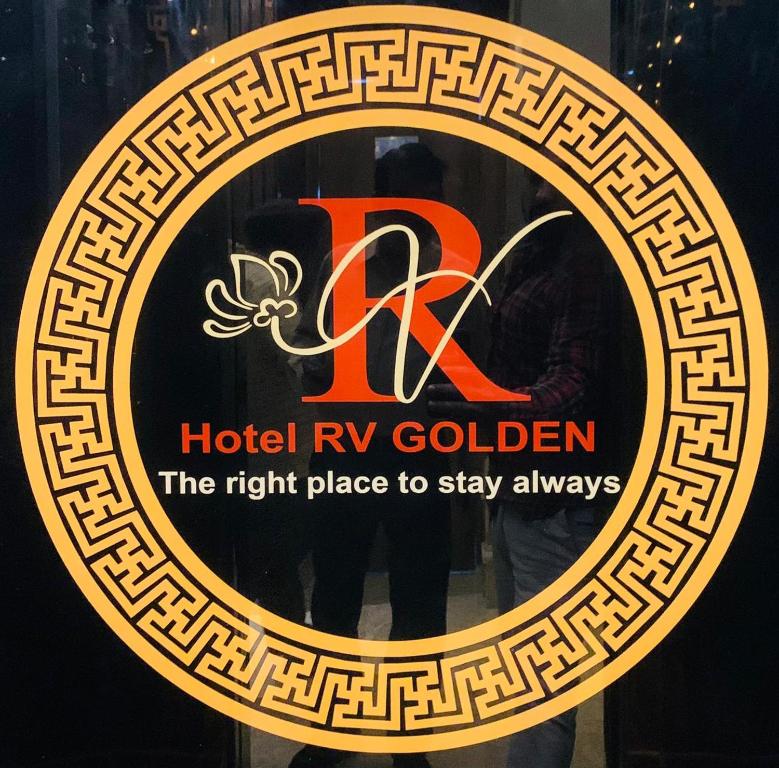 a sign for a hotel rv golden with the right place to stay anywhere at HOTEL RV GOLDEN in Amritsar