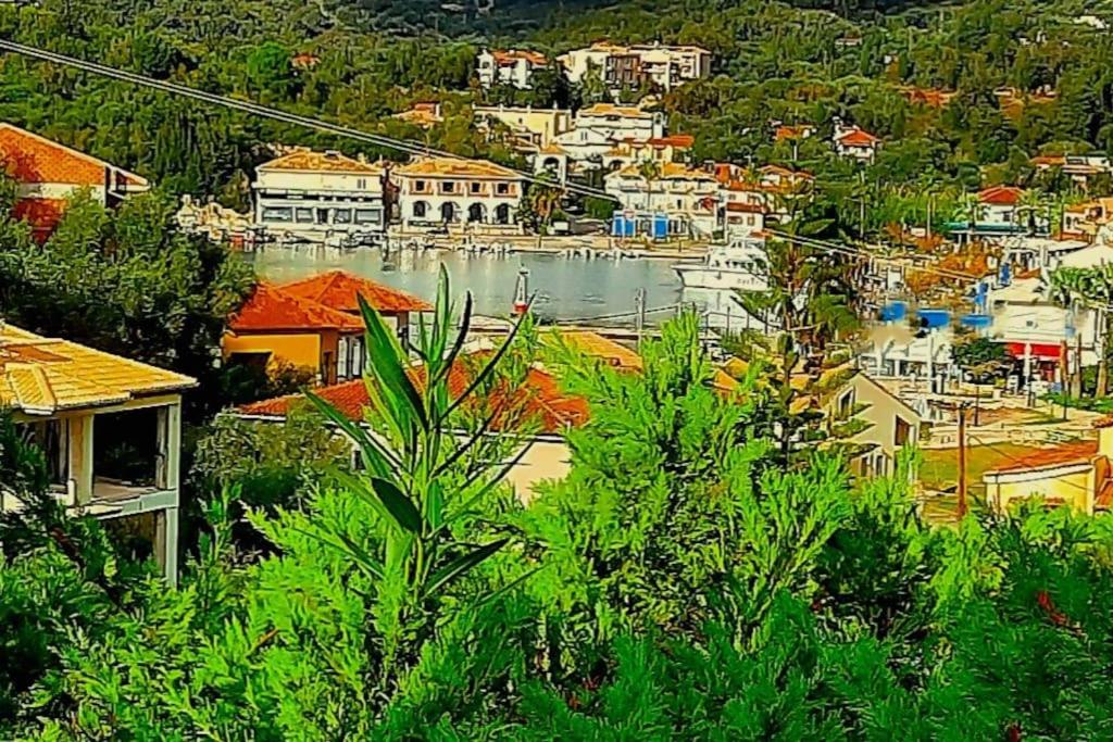 a view of a town with a river and buildings at Marina View Syvota in Sivota
