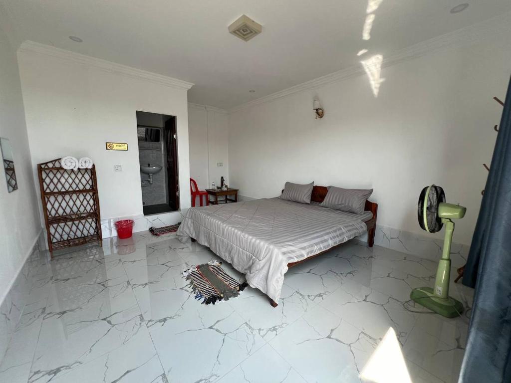 Postel nebo postele na pokoji v ubytování El Ling guesthouse
