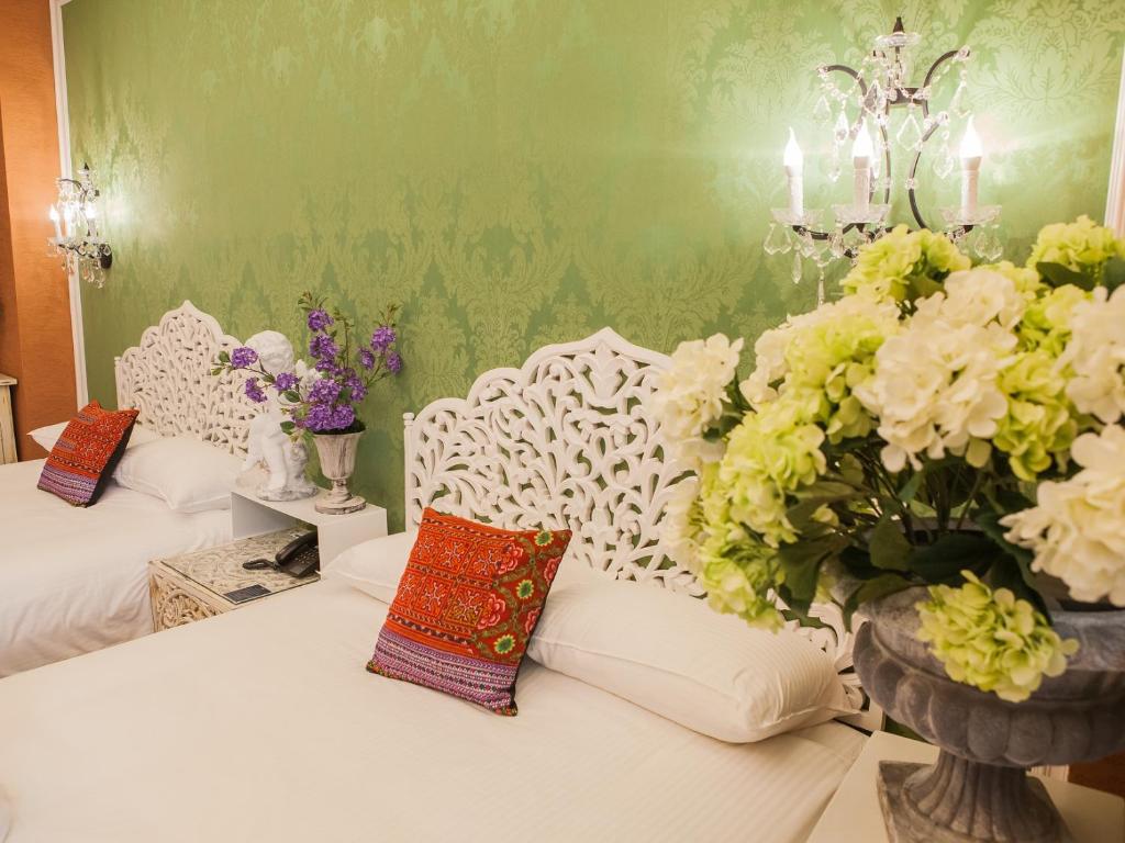 Postel nebo postele na pokoji v ubytování Anna King Hotel