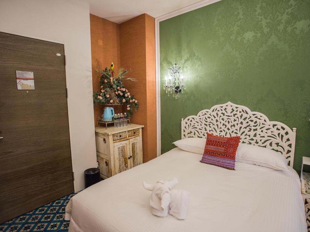 Postel nebo postele na pokoji v ubytování Anna King Hotel