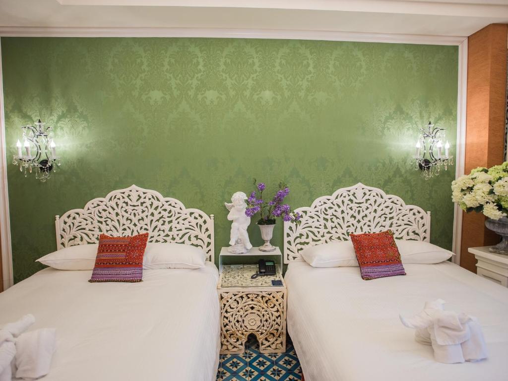 Postel nebo postele na pokoji v ubytování Anna King Hotel