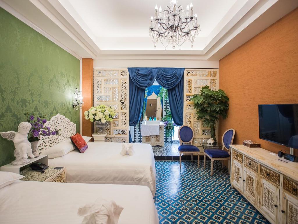 Postel nebo postele na pokoji v ubytování Anna King Hotel