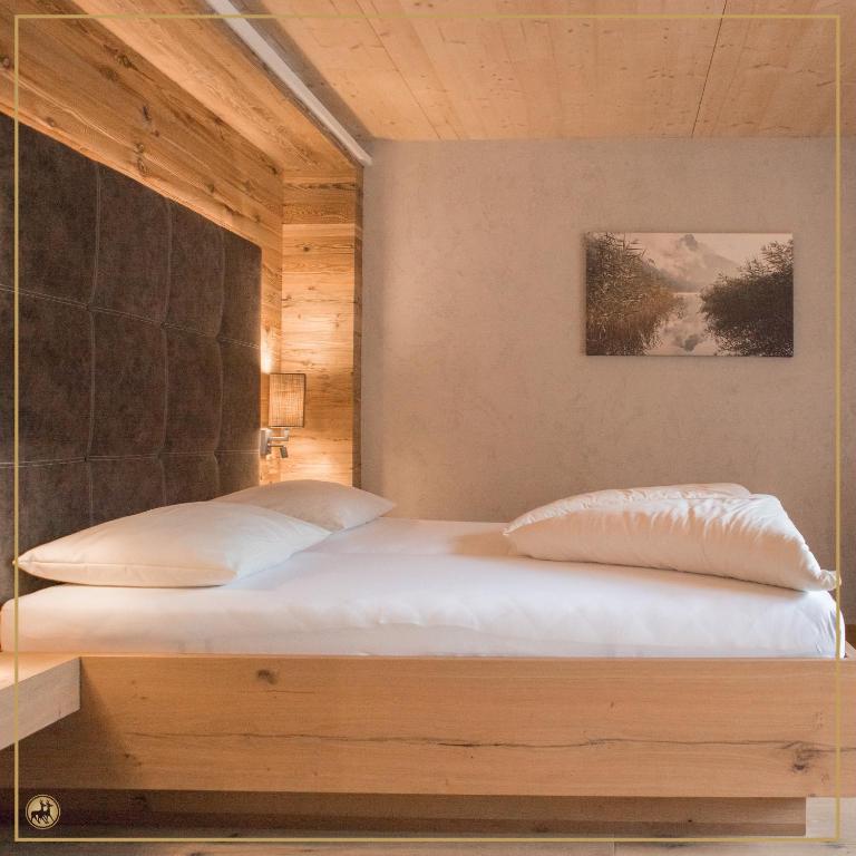 Postel nebo postele na pokoji v ubytování Ruhehotel & Naturresort Rehbach - Adults only