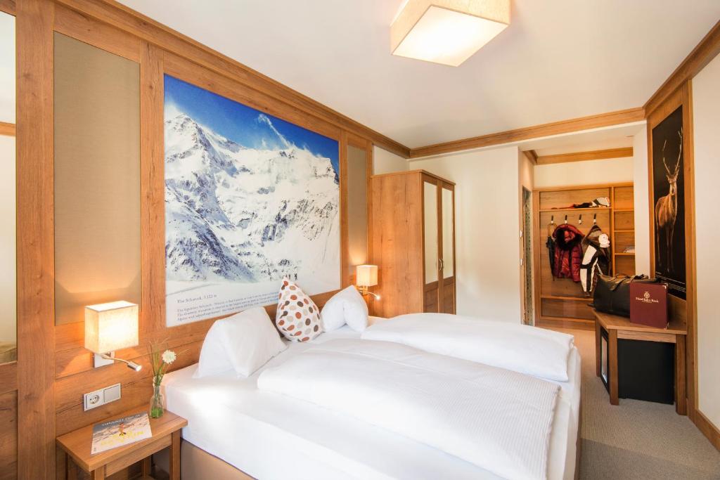 Posteľ alebo postele v izbe v ubytovaní Hotel Eden Rock